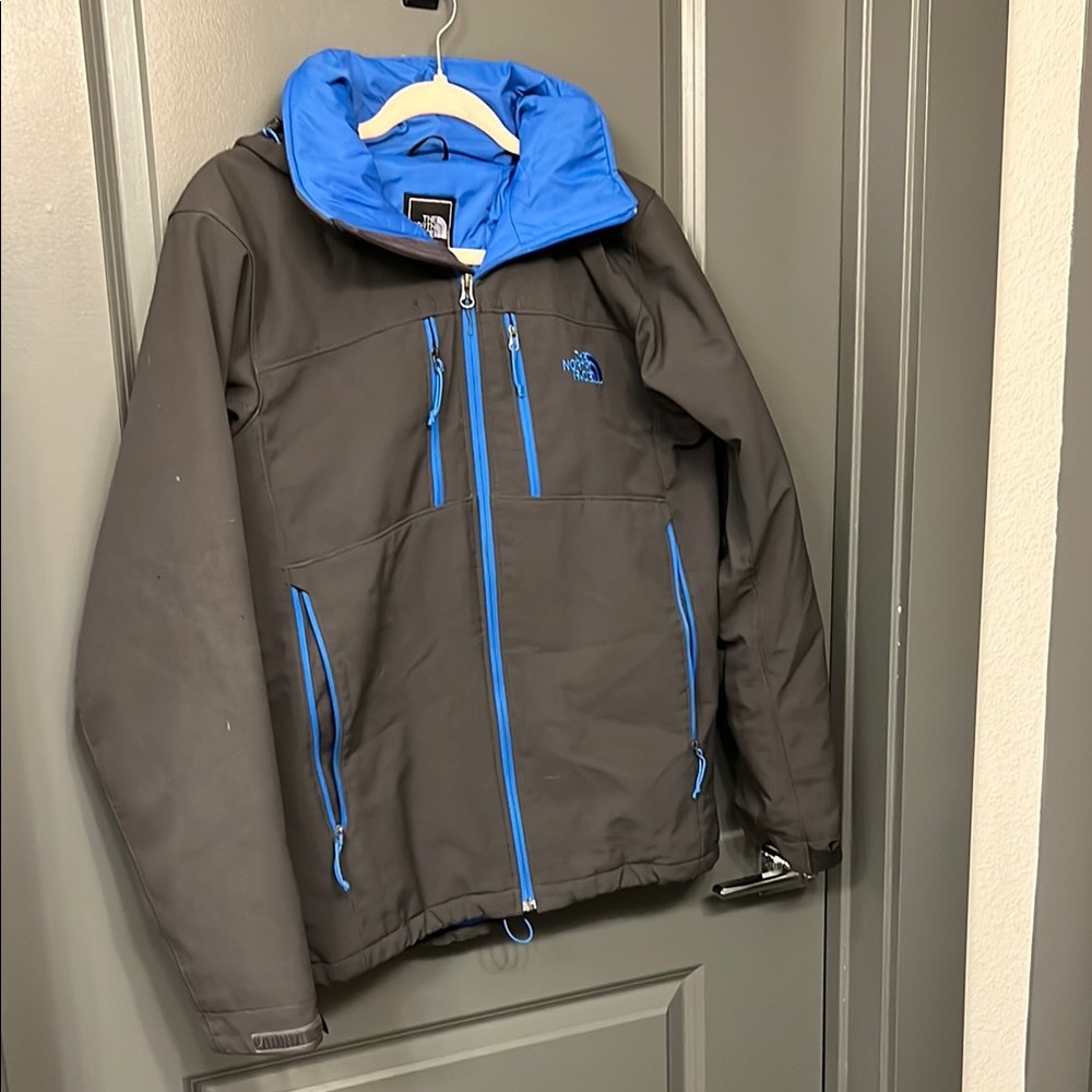 The North Face Charcoal Jacket with Electric Blue Highlights